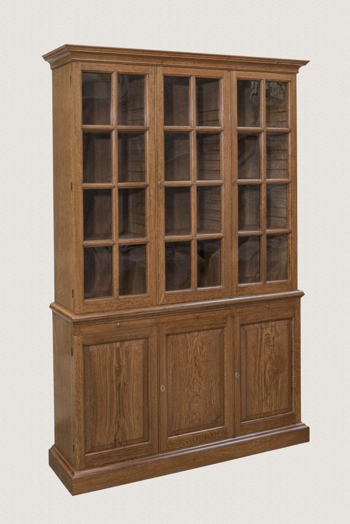 Bespoke glazed oak bookcase made in the workshop
