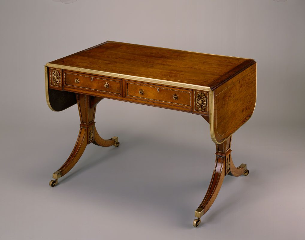 Faded rosewood sofa table with brass mounts and inlaid lines, shown on completion of treatments