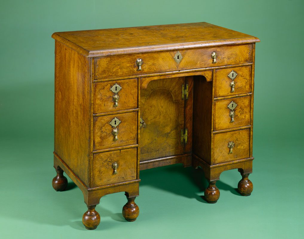 Walnut bureau table of about 1725 with burr walnut panels and herringbone inlay
