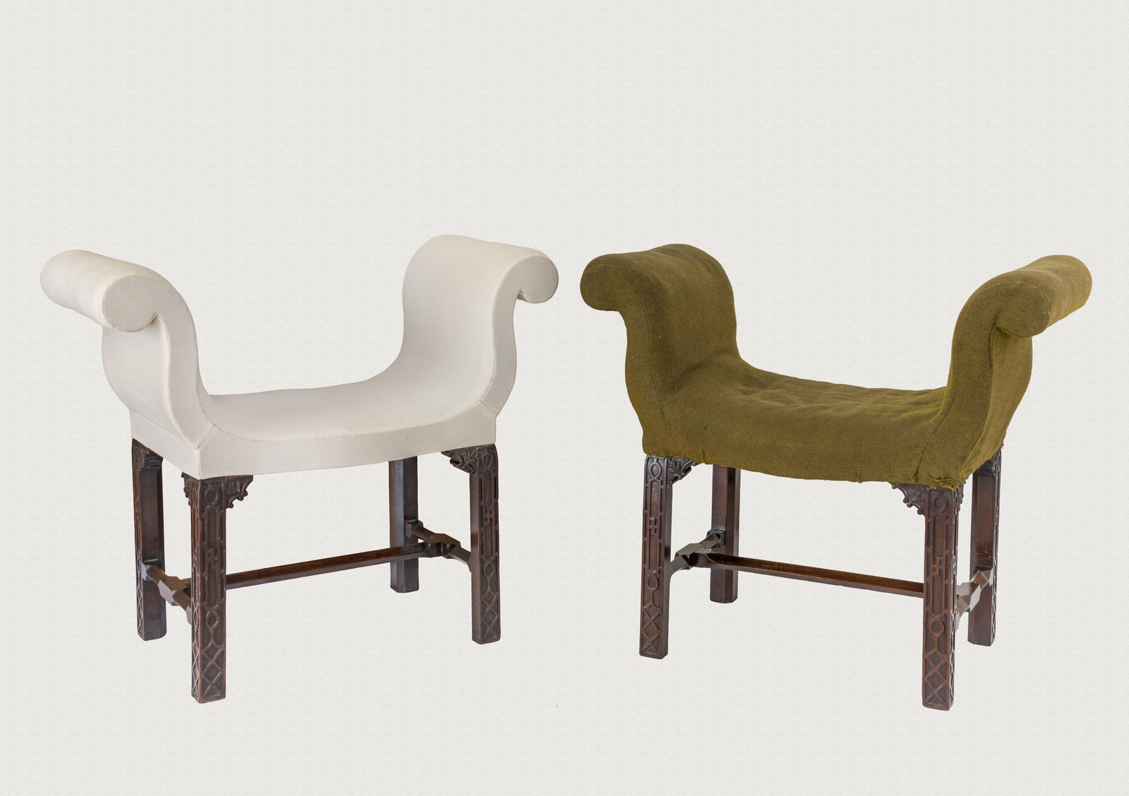 A pair of eighteenth-century scrolled window seats during conservation